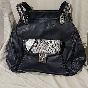 Black handbag uniquely designed